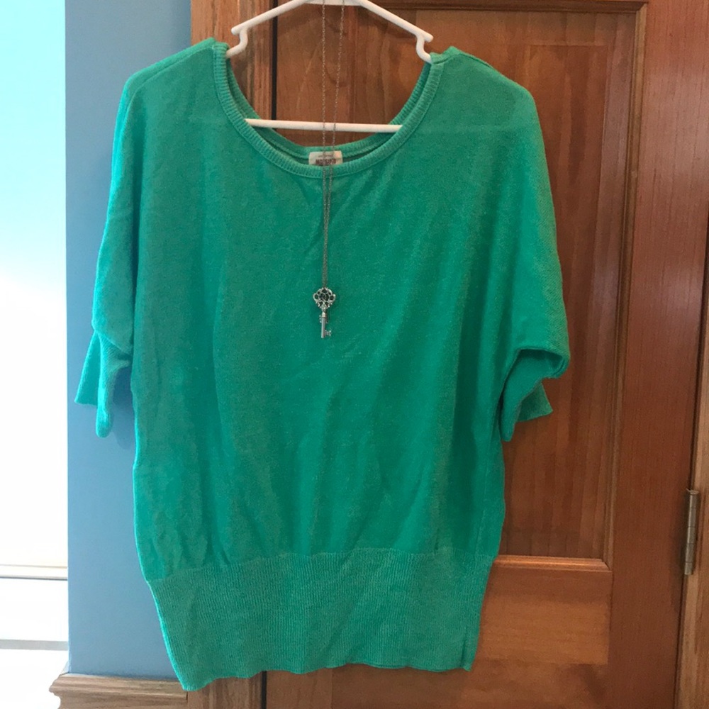 Green sweater, Size Medium. Great condition.